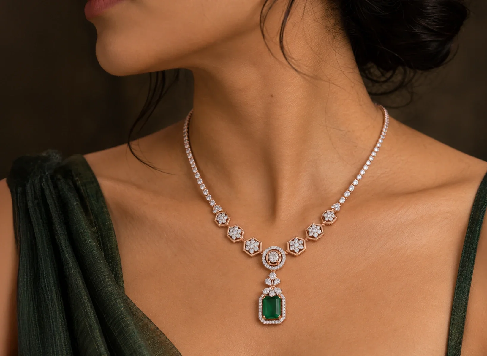 Floral diamond necklace with an emerald green pendant